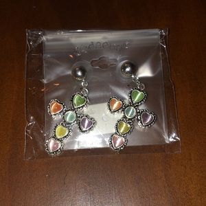 Codeena Cross Earrings  Brand Naw